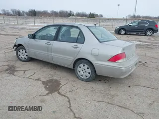 2002 Mitsubishi Lancer ES with VIN JA3AJ26E62U043039, listed as a IAAI auction lot 41600217 with 141,217 mi miles. Bid and sale history available at carsss.com. Image 3.