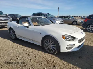2017 FIAT 124 Spider Classica with VIN JC1NFAEK2H0105829, listed as a Copart auction lot 76741874 with 52,992 mi miles and Clean title. Bid and sale history available at DreamBid. Image 4.