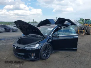 2019 Tesla Model X 75D with VIN 5YJXCBE21KF180203, listed as a IAAI auction lot 42190255 with 114,294 mi miles and . Bid and sale history available at carsss.com. Image 19.