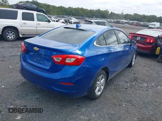 2016 Chevrolet Cruze LT z VIN 1G1BE5SM5G7321470, wystawiony jako IAAI lot #40456371 z przebiegiem 90 350 mil mil oraz . Historia ofert i sprzedaży dostępna na DreamBid. Obrazek 4.