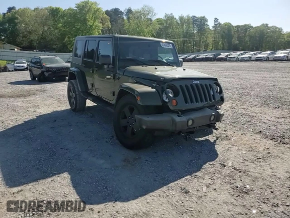 2008 Jeep Wrangler Unlimited Sahara with VIN 1J4GA59148L504608, listed as a Copart auction lot 52400325 with 123,959 mi miles and Salvage Title. Bid and sale history available at carsss.com. Image 11.