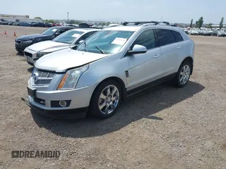 2012 Cadillac SRX Performance Collection with VIN 3GYFNBE37CS615517, listed as a IAAI auction lot 42541029 with 54,159 mi miles and . Bid and sale history available at DreamBid. Image 2.