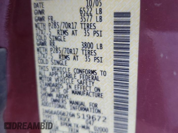 2006 Nissan Titan SE with VIN 1N6BA06B26N519672, listed as a Copart auction lot 74880744 with 144,568 mi miles and Salvage Title. Bid and sale history available at DreamBid. Image 14.