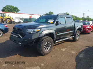 2017 Toyota Tacoma SR5 with VIN 3TMCZ5ANXHM099610, listed as a IAAI auction lot 42441050 with 85,046 mi miles and . Bid and sale history available at DreamBid. Image 2.