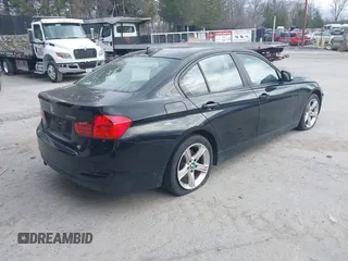 2013 BMW 3 Series 328i xDrive with VIN WBA3B5C55DF598940, listed as a IAAI auction lot 41828448 with 110,184 mi miles. Bid and sale history available at carsss.com. Image 4.