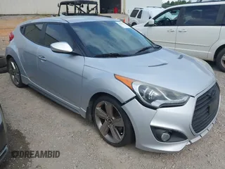 2013 Hyundai Veloster Turbo with VIN KMHTC6AEXDU175173, listed as a IAAI auction lot 42496567 with 124,322 mi miles and . Bid and sale history available at DreamBid. Image 1.