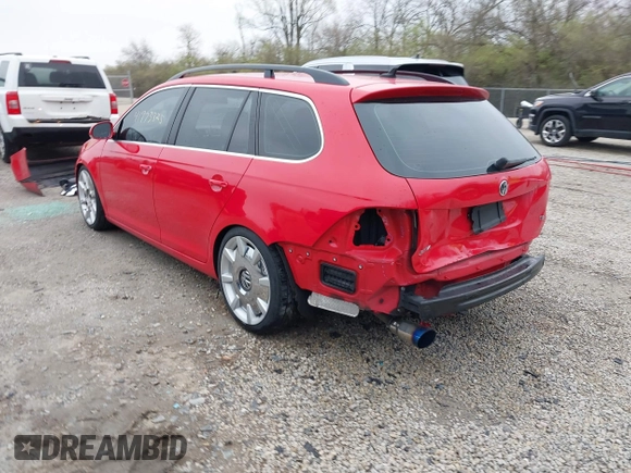 2012 Volkswagen Jetta SportWagen TDI w/Sunroof with VIN 3VWPL7AJ8CM671484, listed as a IAAI auction lot 41973825 with 155,220 mi miles. Bid and sale history available at carsss.com. Image 3.