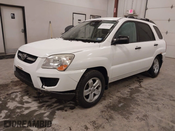 2010 Kia Sportage LX with VIN KNDKGCA35A7718764, listed as a IAAI auction lot 41512368 with 122,420 mi miles and . Bid and sale history available at carsss.com. Image 17.
