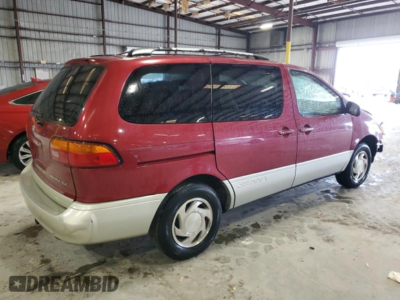 2000 Toyota Sienna LE with VIN 4T3ZF13C0YU258575, listed as a Copart auction lot 53016635 with 252,328 mi miles and Non repairable. Bid and sale history available at DreamBid. Image 3.