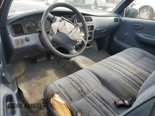 1994 Toyota T100 DX z VIN JT4VD10A3R0022337, wystawiony jako Copart lot #72793774 z przebiegiem 147 891 mil mil oraz Tytuł czysty. Historia ofert i sprzedaży dostępna na DreamBid. Obrazek 8.