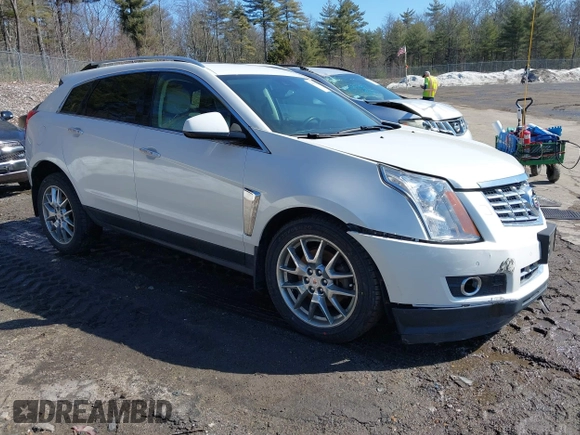 2014 Cadillac SRX Performance Collection with VIN 3GYFNFE30ES586713, listed as a IAAI auction lot 41791356 with 74,927 mi miles and . Bid and sale history available at DreamBid. Image 1.