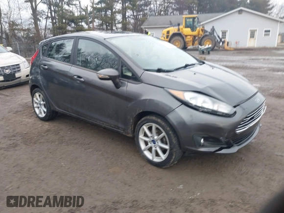 2018 Ford Fiesta SE with VIN 3FADP4EJ9JM126299, listed as a IAAI auction lot 41660973 with 74,730 mi miles. Bid and sale history available at carsss.com. Image 1.