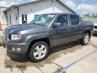 2013 Honda Ridgeline RTL with VIN 5FPYK1F57DB003661, listed as a Copart auction lot 60555205 with 123,487 mi miles and Salvage title. Bid and sale history available at DreamBid. Image 1.