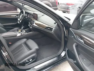 2019 BMW 5 Series 530i with VIN WBAJA5C50KWW38431, listed as a IAAI auction lot 41483263 with 94,436 mi miles. Bid and sale history available at carsss.com. Image 5.