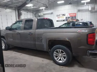 2014 Chevrolet Silverado 1500 LT with VIN 1GCVKREC9EZ240612, listed as a IAAI auction lot 41108566 with 200,625 mi miles and . Bid and sale history available at DreamBid. Image 15.