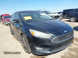 2015 Ford Focus SE with VIN 1FADP3F24FL313640, listed as a IAAI auction lot 41651845 with 146,390 mi miles. Bid and sale history available at carsss.com. Image 1.