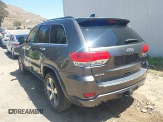 2015 Jeep Grand Cherokee Overland with VIN 1C4RJFCG7FC839778, listed as a IAAI auction lot 42490111 with 160,040 mi miles and . Bid and sale history available at DreamBid. Image 3.