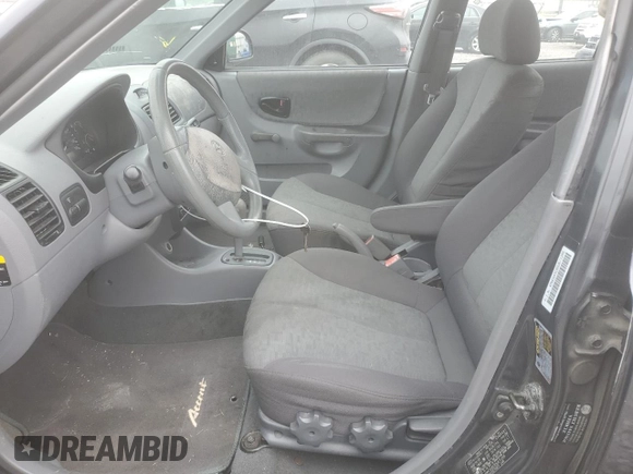 2005 Hyundai Accent GLS with VIN KMHCG45C85U671205, listed as a Copart auction lot 44362455 with 93,032 mi miles and Salvage Title. Bid and sale history available at carsss.com. Image 7.