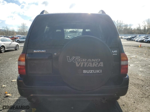 2002 Suzuki Grand Vitara JLX with VIN JS3TD62V324154082, listed as a Copart auction lot 84174574 with 236,372 mi miles and Salvage Title. Bid and sale history available at carsss.com. Image 6.