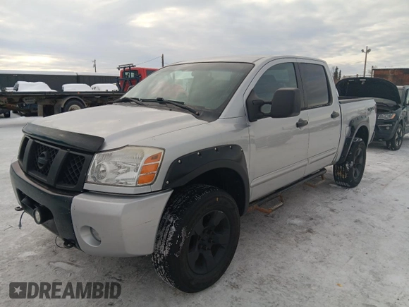 2005 Nissan Titan SE with VIN 1N6BA07B15N535701, listed as a Copart auction lot 46502565 with 180,923 mi miles and Salvage Title. Bid and sale history available at DreamBid. Image 1.