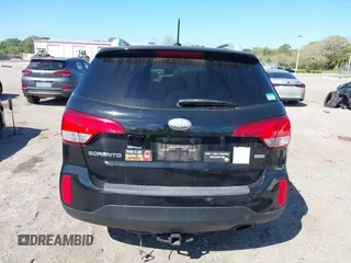 2014 Kia Sorento LX with VIN 5XYKT4A69EG468157, listed as a IAAI auction lot 41771810 with 144,214 mi miles. Bid and sale history available at carsss.com. Image 16.