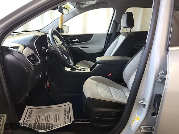 2020 Chevrolet Equinox LT z VIN 2GNAXJEV0L6231512, wystawiony jako IAAI lot #42516878 z przebiegiem 67 453 mil mil oraz . Historia ofert i sprzedaży dostępna na DreamBid. Obrazek 5.