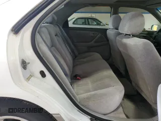 1998 Toyota Camry LE z VIN 4T1BF22K1WU048928, wystawiony jako Copart lot #57654365 z przebiegiem 132 087 mil mil oraz Czysty tytuł • Clean title. Historia ofert i sprzedaży dostępna na DreamBid. Obrazek 10.