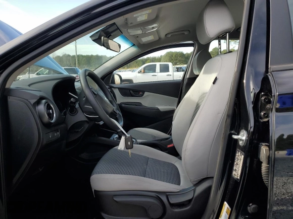 2023 Hyundai Kona SE with VIN KM8K22AB3PU996424, listed as a Copart auction lot 44826165 with 56,315 mi miles and Salvage Title. Bid and sale history available at DreamBid. Image 7.