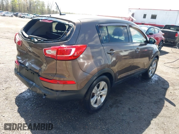2012 Kia Sportage LX with VIN KNDPBCA27C7293143, listed as a IAAI auction lot 41980919 with 206,457 mi miles and . Bid and sale history available at DreamBid. Image 4.