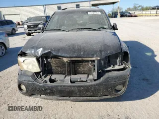 2002 GMC Envoy SLE with VIN 1GKDS13S022512481, listed as a Copart auction lot 74701454 with 0 mi miles and Salvage Title. Bid and sale history available at carsss.com. Image 5.