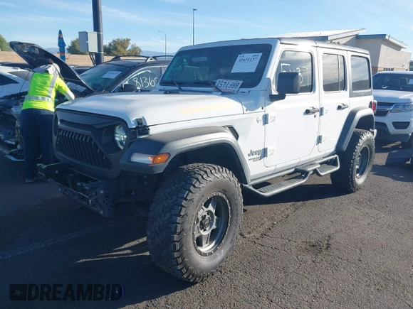 2020 Jeep Wrangler Unlimited Sport S z VIN 1C4HJXDG7LW201699, wystawiony jako IAAI lot #41651137 z przebiegiem 66 777 mil mil oraz . Historia ofert i sprzedaży dostępna na DreamBid. Obrazek 18.