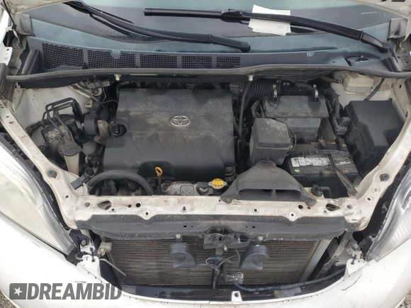2012 Toyota Sienna XLE AAS with VIN 5TDYK3DC0CS212613, listed as a Copart auction lot 62317765 with 258,124 mi miles and Salvage title. Bid and sale history available at DreamBid. Image 12.
