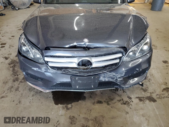 2015 Mercedes-Benz E 350 Luxury with VIN WDDHH8JB0FB134830, listed as a Copart auction lot 70855934 with 106,717 mi miles and Salvage title. Bid and sale history available at DreamBid. Image 11.