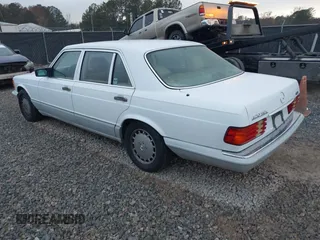 1989 Mercedes-Benz 420 Series 420SEL with VIN WDBCA35E4KA456613, listed as a IAAI auction lot 41145650 with 199,599 mi miles. Bid and sale history available at carsss.com. Image 3.