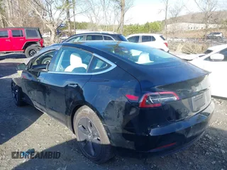 2019 Tesla Model 3 Mid Range z VIN 5YJ3E1EA4KF317872, wystawiony jako IAAI lot #41491269 z przebiegiem 90 772 mil mil oraz . Historia ofert i sprzedaży dostępna na DreamBid. Obrazek 13.