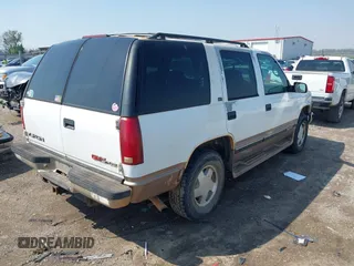 1996 GMC Yukon with VIN 1GKEK13R2TJ746811, listed as a IAAI auction lot 41955840 with 2,242,108 mi miles. Bid and sale history available at carsss.com. Image 15.