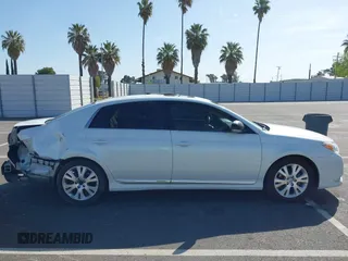 2011 Toyota Avalon with VIN 4T1BK3DB0BU414192, listed as a IAAI auction lot 42099301 with 220,967 mi miles and . Bid and sale history available at carsss.com. Image 13.