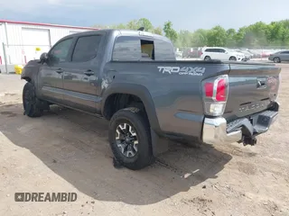 2023 Toyota Tacoma SR with VIN 3TMCZ5AN0PM636306, listed as a IAAI auction lot 42255935 with 14,131 mi miles and . Bid and sale history available at DreamBid. Image 3.