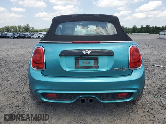 2018 MINI Convertible Cooper S with VIN WMWWG9C59J3D22587, listed as a Copart auction lot 61673415 with 34,935 mi miles and Salvage title. Bid and sale history available at DreamBid. Image 6.