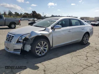 2013 Cadillac XTS Luxury with VIN 2G61P5S39D9187600, listed as a Copart auction lot 53516955 with 67,888 mi miles and Salvage Title. Bid and sale history available at carsss.com. Image 1.