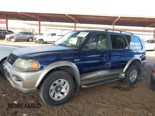 2001 Mitsubishi Montero Sport LS with VIN JA4MT31H71P007335, listed as a IAAI auction lot 41465825 with 258,707 mi miles. Bid and sale history available at carsss.com. Image 14.