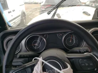 2020 Jeep Gladiator Sport S с VIN 1C6HJTAG5LL173357, выставлен на аукционе Copart как лот 55679915 с пробегом Не указан миль и Списание • Salvage title. История ставок и продаж доступна на DreamBid. Изображение 9.