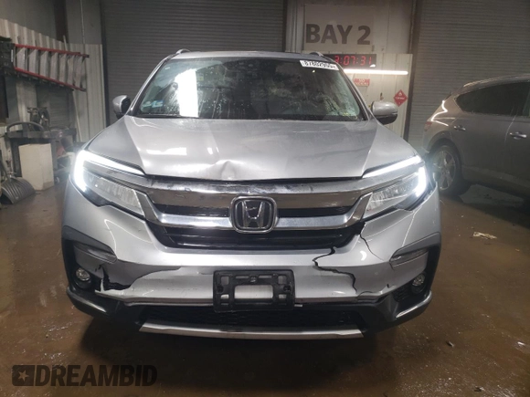 2021 Honda Pilot Elite with VIN 5FNYF6H04MB053008, listed as a Copart auction lot 87802955 with 70,737 mi miles and Salvage Title. Bid and sale history available at carsss.com. Image 5.