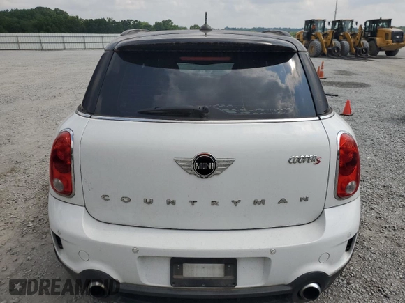 2014 MINI Countryman S with VIN WMWZC3C53EWP27156, listed as a Copart auction lot 59579765 with 159,308 mi miles and Salvage title. Bid and sale history available at DreamBid. Image 6.