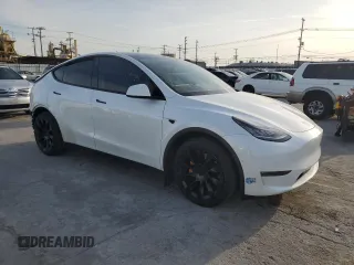 2021 Tesla Model Y Long Range z VIN 5YJYGDEE7MF090698, wystawiony jako Copart lot #44192555 z przebiegiem 78 907 mil mil oraz Szkoda całkowita • Salvage title. Historia ofert i sprzedaży dostępna na DreamBid. Obrazek 4.
