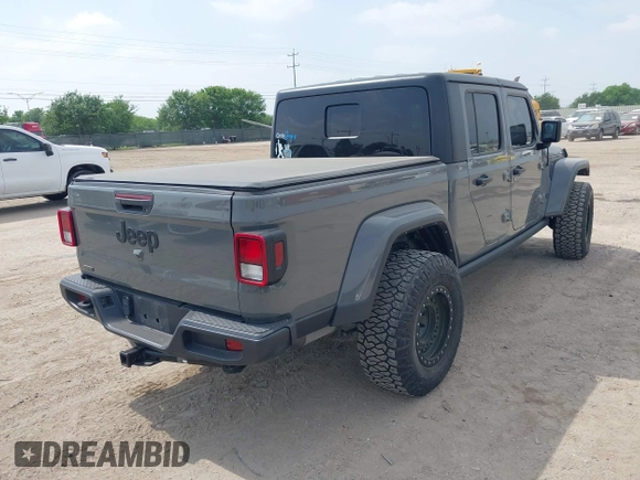2021 Jeep Gladiator Sport S z VIN 1C6JJTAM1ML607525, wystawiony jako IAAI lot #41941550 z przebiegiem 59 283 mil mil oraz . Historia ofert i sprzedaży dostępna na DreamBid. Obrazek 4.
