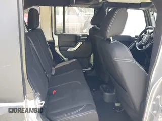 2016 Jeep Wrangler Unlimited Rubicon Hard Rock with VIN 1C4BJWFG6GL265320, listed as a IAAI auction lot 42260151 with Not provided miles and . Bid and sale history available at DreamBid. Image 8.