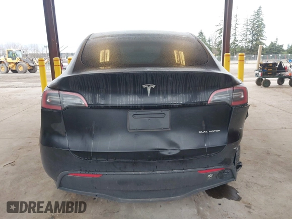 2023 Tesla Model Y Long Range with VIN 7SAYGAEEXPF707503, listed as a IAAI auction lot 41712166 with 27,467 mi miles and . Bid and sale history available at carsss.com. Image 16.