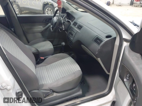 2007 Ford Focus S z VIN 1FAFP34N87W360398, wystawiony jako IAAI lot #42395300 z przebiegiem 96 220 mil mil oraz . Historia ofert i sprzedaży dostępna na DreamBid. Obrazek 5.