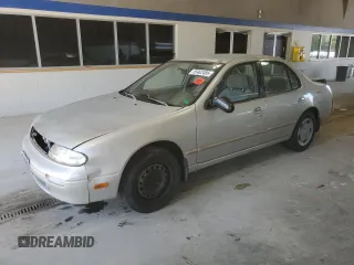 1997 Nissan Altima XE z VIN 1N4BU31D0VC250558, wystawiony jako Copart lot #55462485 z przebiegiem 250 009 mil mil oraz Szkoda całkowita • Salvage title. Historia ofert i sprzedaży dostępna na DreamBid. Obrazek 1.